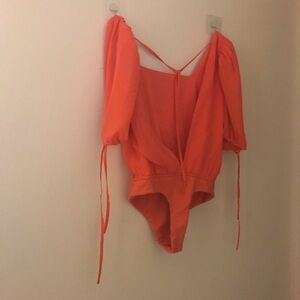 *3 for 25 Bundle and Save.Orange Puff Sleeve Bodysuit